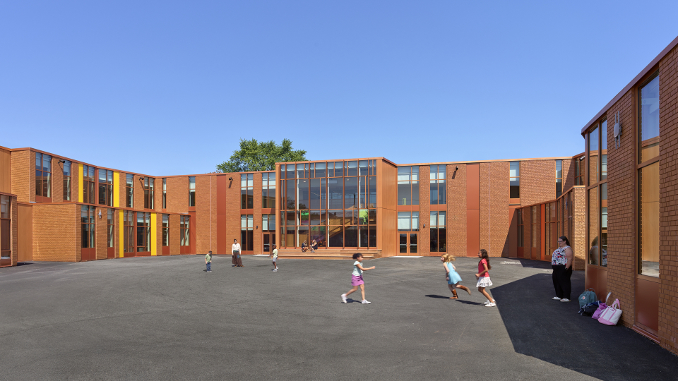 Step-down Wings Surround the Child-scaled Recess and Outdoor Classroom Courtyard  