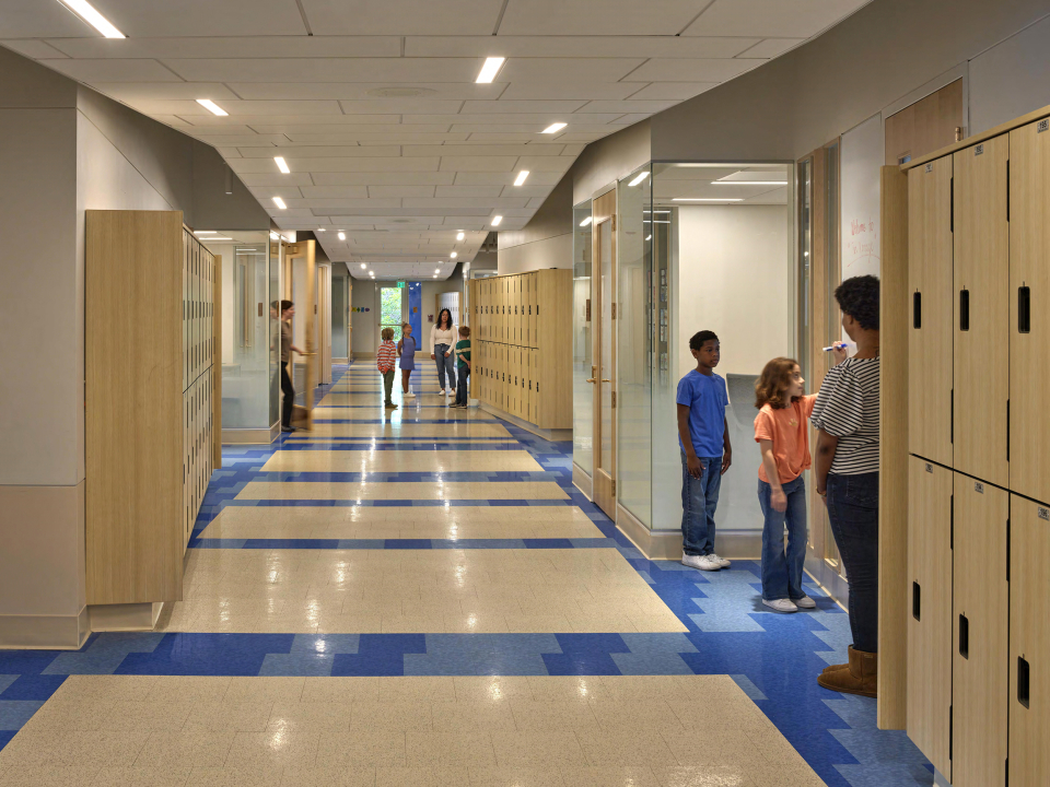 Joyful, Variegated Corridorscape - Actively Occupied and Supervised by Projecting Glass-enclosed Teacher Planning Offices