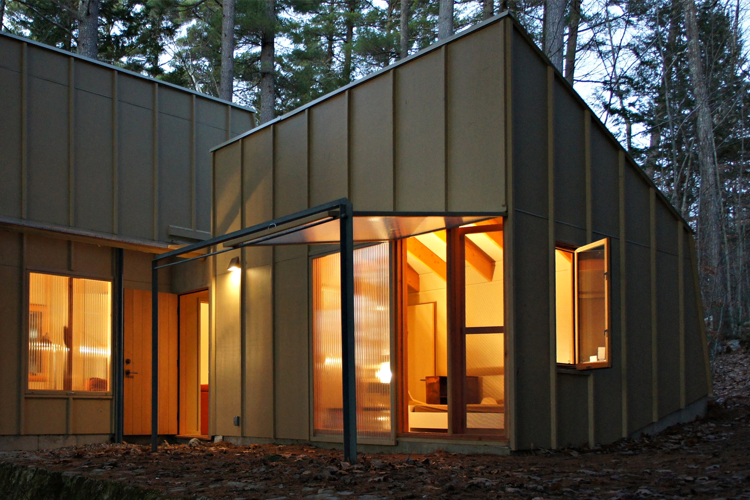 Translucent walls, unfolded for the season, transformed into a porch