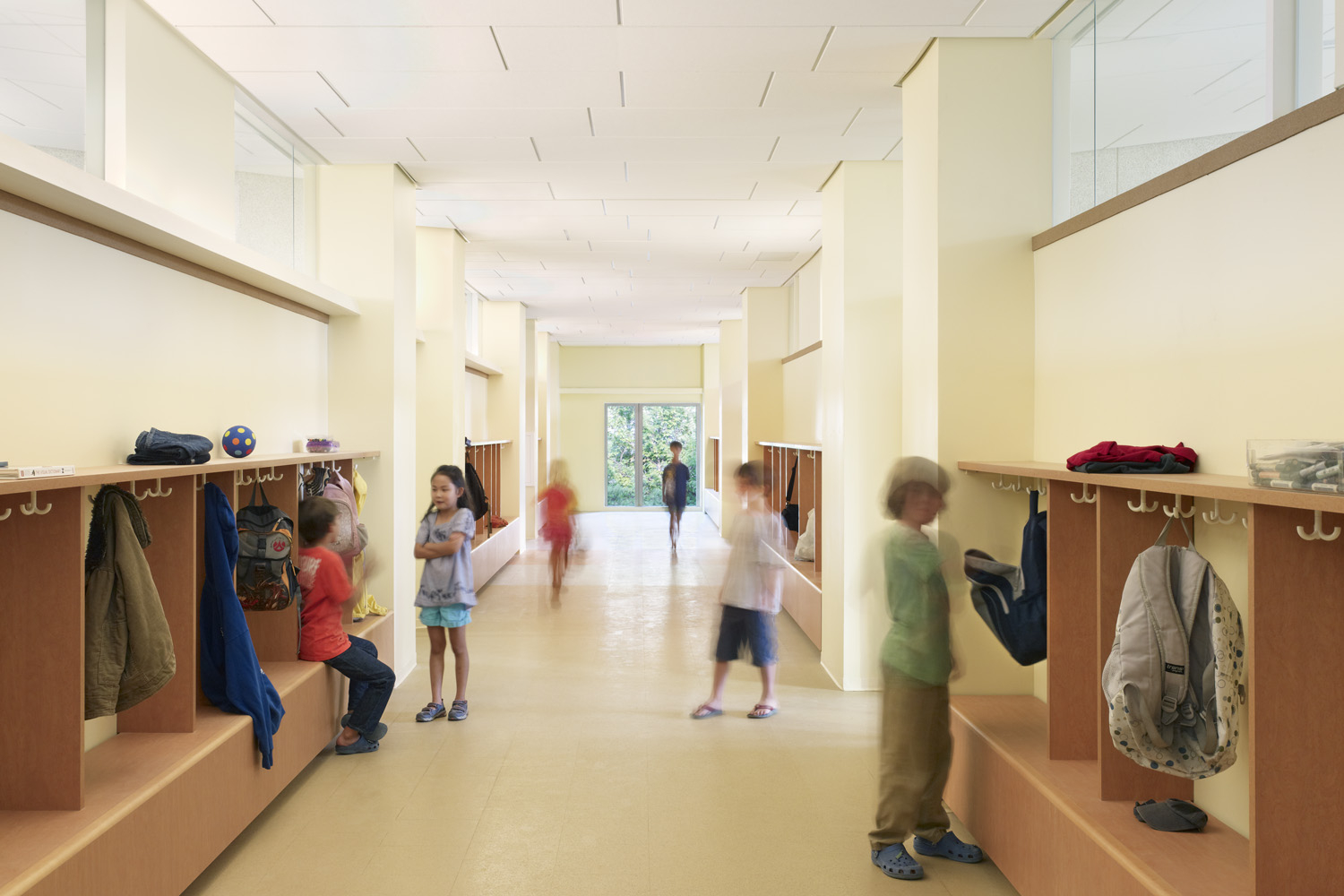 Light borrowing high windows & continuous ceiling form